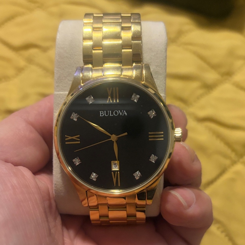 Bulova Gold Watch with Black Dial and Diamond Markers